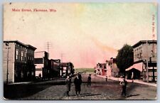 Florence WI Pedestrians on Dirt Main St~Shops on Either Side~1910 Postcard picture