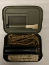    BRITISH ENFIELD RIFLE CLEANING KIT IN METAL TIN.  picture
