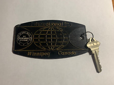 International Inn Hotel Motel Room Key Fob & Key Winnipeg Canada #312 picture