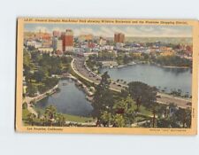Postcard Gen. MacArthur Park Showing Wilshire Blvd. & Westlake Shopping District picture