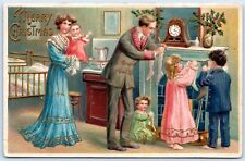 Postcard Merry Christmas Children Hanging Stockings Fireplace Mantle Clock P8L picture