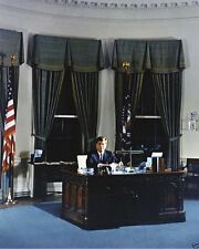 President John F. Kennedy poses for portrait at Oval Office desk New 8x10 Photo picture