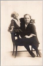 1910s Studio RPPC Postcard Girl with Sister that Looks Like Ventriloquist's Doll picture