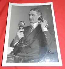 Vintage Press Photo by Paul Thompson - Unknown man talks on Candlestick telephon picture