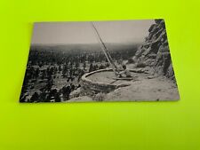 Puye, New Mexico ~ Pueblo Indian Emerging From Kiva Cliff Ruins Vintage Postcard picture