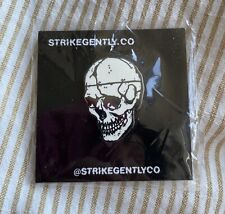 Strike Gently Co Enamel White Skull Uncommon Retired Lapel Button picture