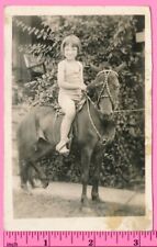 Little Pony Ride Cute Smiling Girl on Mini Riding Horse Vintage Snapshot Photo picture