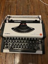 Vintage 1970s Olympia Traveller de Luxe German-designed Typewriter picture