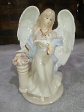 Vtg.House Of Lloyd Musical Porcelaine Angel Holding A Dog 8 in. picture