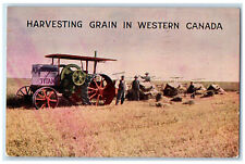 1913 Harvesting Grain Equipment in Western Canada Posted Antique Postcard picture