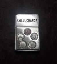 Out Of Print 2003 Small Change Zippo picture