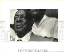 1992 Press Photo Reverend James Powell listens to speakers Canaan Baptist Church picture