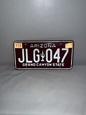 Vintage Arizona License Plate Maroon 1980s 1990s JLG 047 Saguaro Cactus Base picture