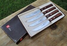 VINTAGE SET OF 4 ZWILLING J.A. HENCKELS TWINS STEAK KNIVES KNIFE MADE IN HOLLAND picture