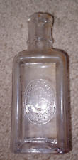 Vintage THE SINGER MANFC CO. Clear Embossed Glass Sewing Machine Oil Bottle picture