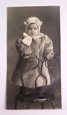 Vintage Photo of a Very Cute Little Girl Dressed in Fur Winter Coat picture