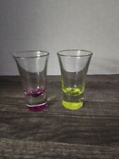 2 Clear And Colored Bottom Shot Glasses Yellow and Pink. picture