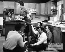 JULIA CHILD WITH ASSISTANTS ON SET OF 