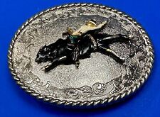 Rare-  Rodeo Cowboy putting on a show western oval belt buckle by Raintree picture