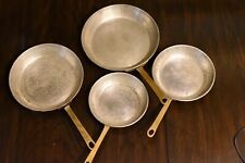Set of Four Hammered Copper Pans picture