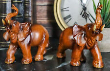 Ebros Faux Wood Feng Shui Elephant with Trunk Up Statue Set of 2 picture