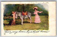 1908 Vintage Posted Postcard, Lady and Donkey with a small Child / Cupid picture