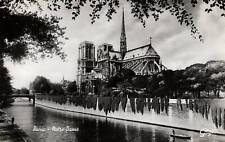 VINTAGE POSTCARD NOTRE DAME CHURCH VIW FROM THE SEINE RIVER PARIS c. 1925 picture