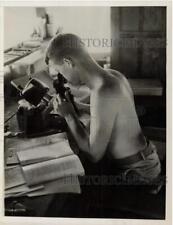 1943 Press Photo Dr. James Douglas Examines Mosquito for Malaria, Guadalcanal picture