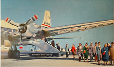 United Air Lines Postcard DC-6 DC-6B airport passengers disembarking picture