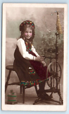 RPPC tinted little girl traditional Bunad dress weaving spinning NORWAY Postcard picture