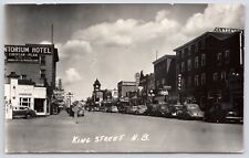 Postcard RPPC King St. Hotels Signs Clocktower North Battleford SK, Canada 1940s picture