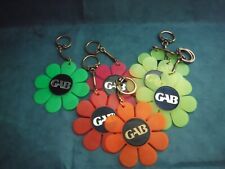 Vintage large florescent red plastic daisy keychain picture