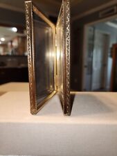 vintage MCM bi-fold 3-1/5x 5 inch picture frame with gold tone non-tarnish metal picture
