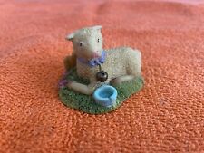 Decorative Collectible Lamb Figurine. Lamb Laying In The Grass  picture