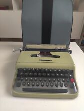 OLIVETTI LETTERA 22 TYPEWRITER. GREEN. MADE IN ITALY BY IVREA IN 1953 picture