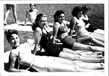 Pretty women in bathing suits sunbathing at the park Found Photo V0494 picture