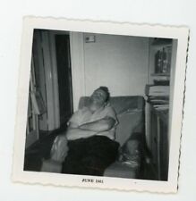 Man napping /  sleeping in reclining chair  Vintage color found photo  picture