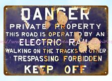 Danger trespass forbidden keep off Northern Electric Railroad train track sign picture