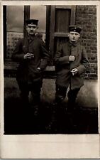 c1917 WW1 GERMAN SOLDIERS SMOKING ON STREET REAL PHOTO POSTCARD 29-139 picture