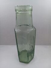 Vintage 6 sided green glass bottle. E 14oz etched on base. picture