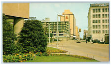 c1960's New Architechture in Foreground Orange Avenue Orlando FL Postcard picture
