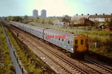 PHOTO  4-EPB CLASS 415 4-CAR EMU NOS5125 (AND TWO 2-HAPS) S AT WHITTON ON A WIND picture