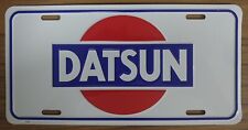 DATSUN LICENSE PLATE EMBOSSED METAL  VINTAGE NEW OLD STOCK 210 240 510 620 #2706 picture