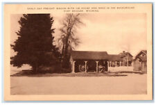 c1940's Early Day Freight Wagon with Ice House Fort Bridger Wyoming WY Postcard picture