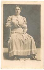 Vintage RP PC; Serious-Looking Young Woman Poses Sitting w/Gloves in Hand picture