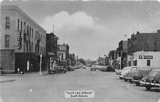 J53/ Milbank South Dakota Postcard c1950s Hotel Firestone Store Autos 330 picture