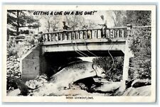 1959 Man Cached Exaggerated Fish Sioux Lookout Ontario RPPC Photo Postcard picture