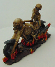Skelton on motorcycles through flame figurine - damage picture