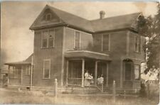 RPPC KINGSBURG CALIFORNIA 1909 FAMILY POSES INFRONT OF RESEDENTIAL HOME POSTCARD picture