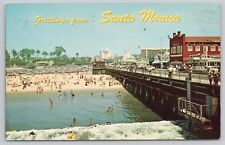 Santa Monica California, Greetings, Famous Pier Beach Sunbathers, VTG Postcard picture